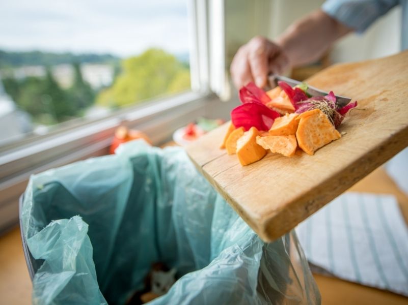 Food scraps being bagged for compost.