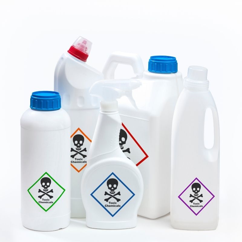 Various differently sized containers with labels displaying skulls and crossbones that say "Toxic Chemicals."